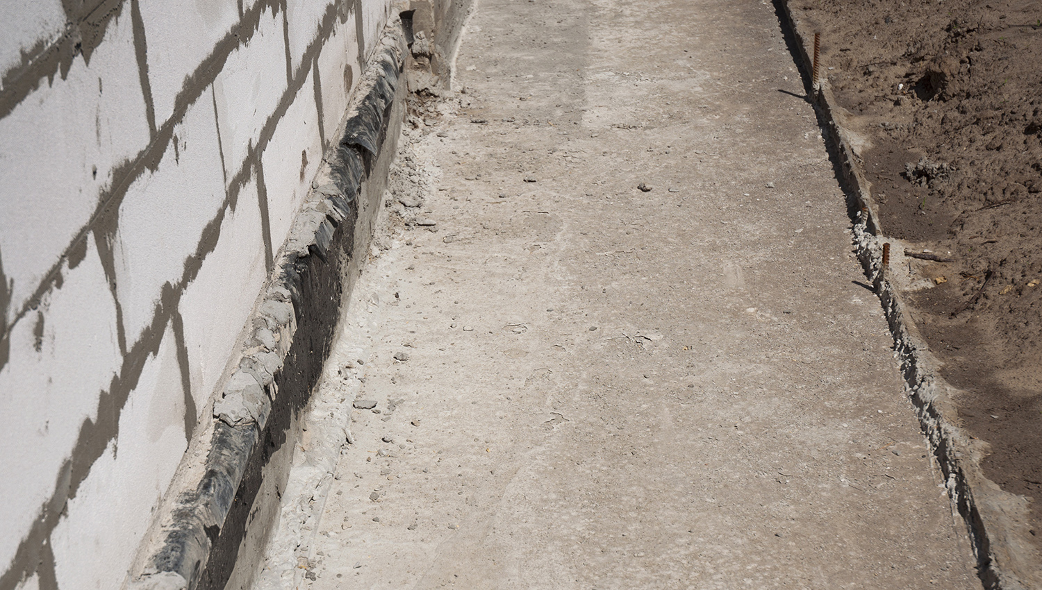 Home foundation, prepped for waterproofing system installation