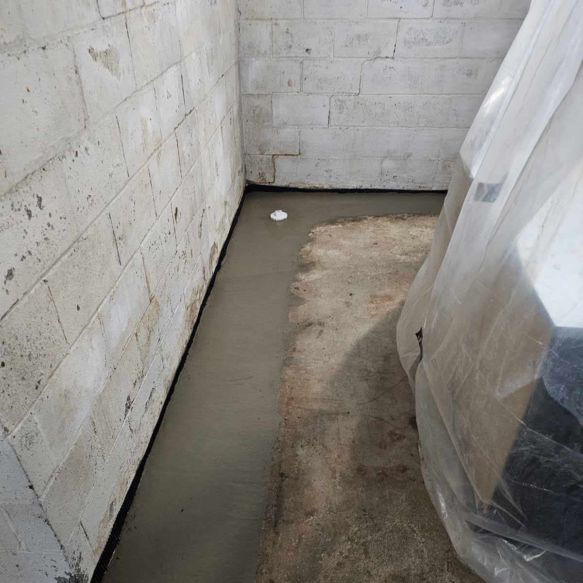 Basement with new waterproof membrane installed to prevent flooding