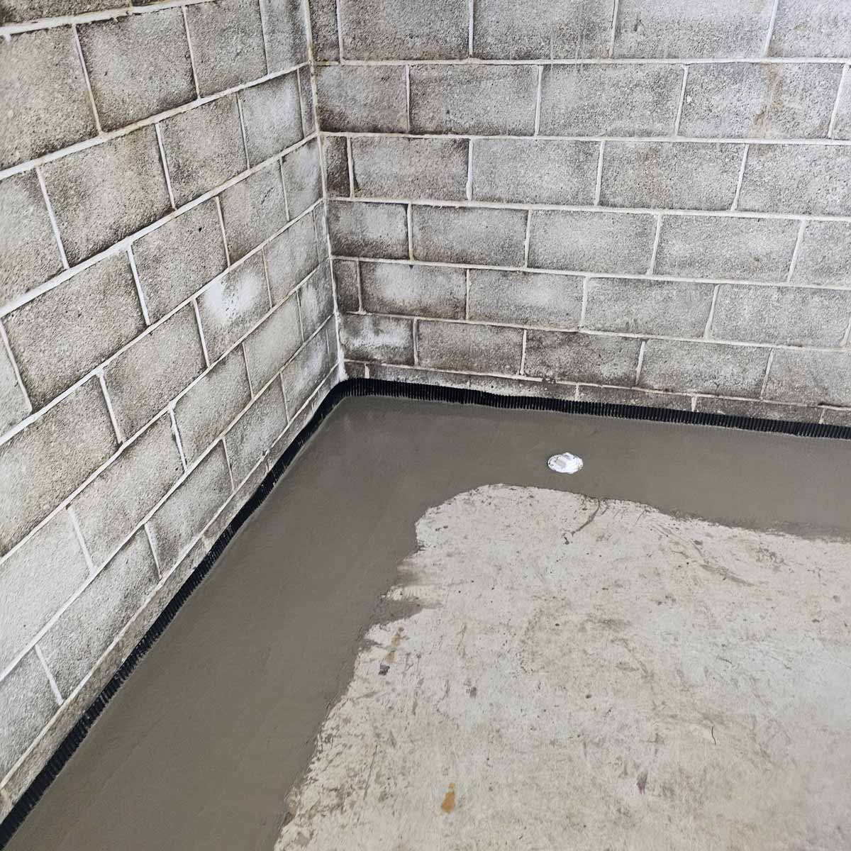 Crawlspace with new waterproof membrane installed to prevent flooding