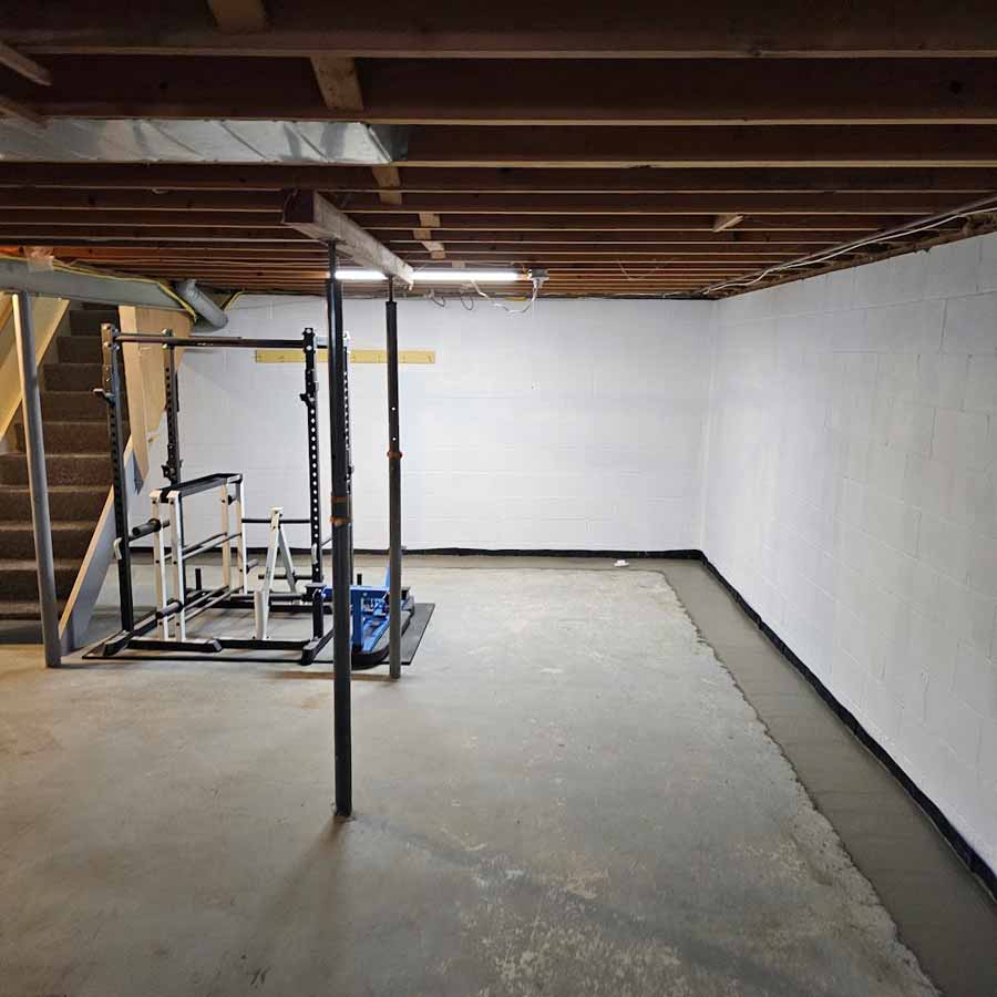 Basement with new waterproof barrier installed