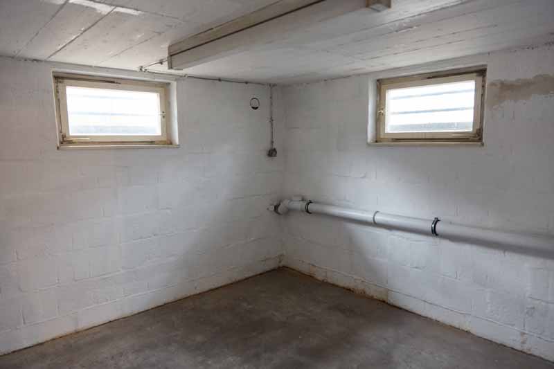 Corner of unfinished, un-waterproofed basement